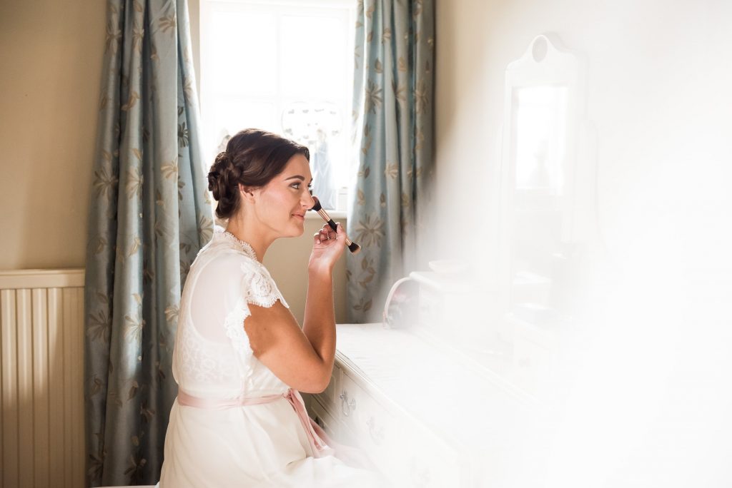 Jay West Bride with hair and make up by Amanda Steed pre wedding prep