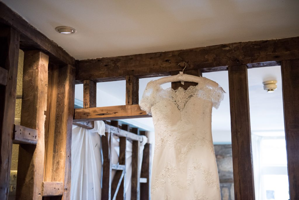 Hanging bridal dress from Wedding Dress Retail Outlet Cornwall beach wedding