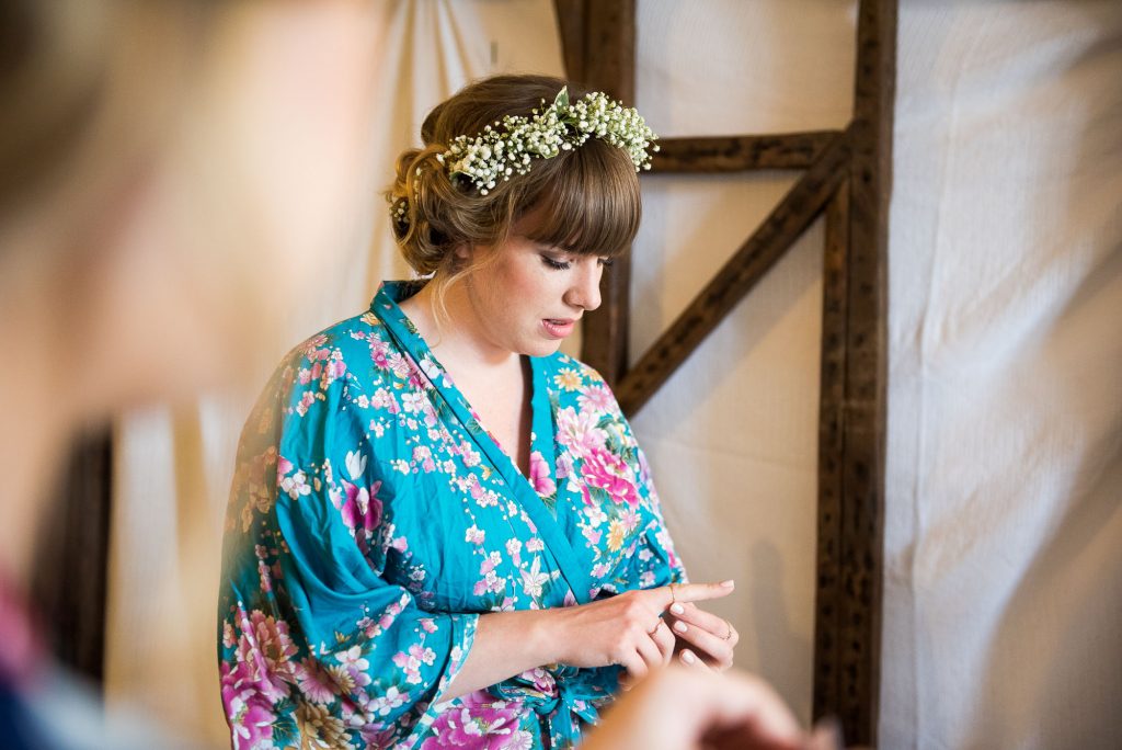 Bridesmaid wearing floral robe with floral crown Cornwall