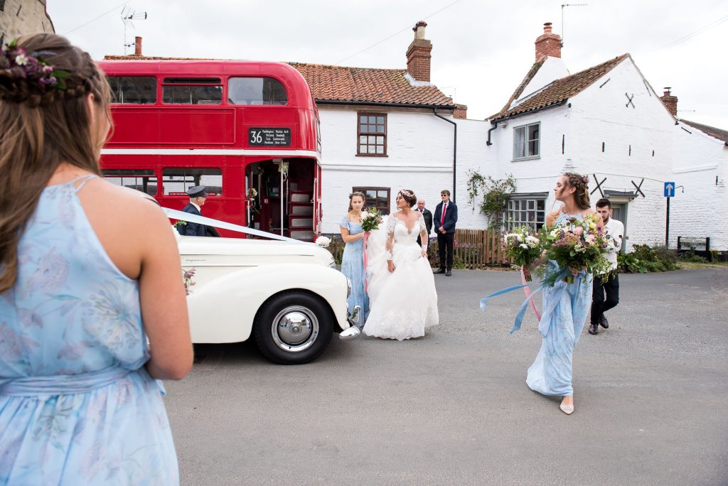 Natural wedding photography with vintage transport Spixworth Hall wedding