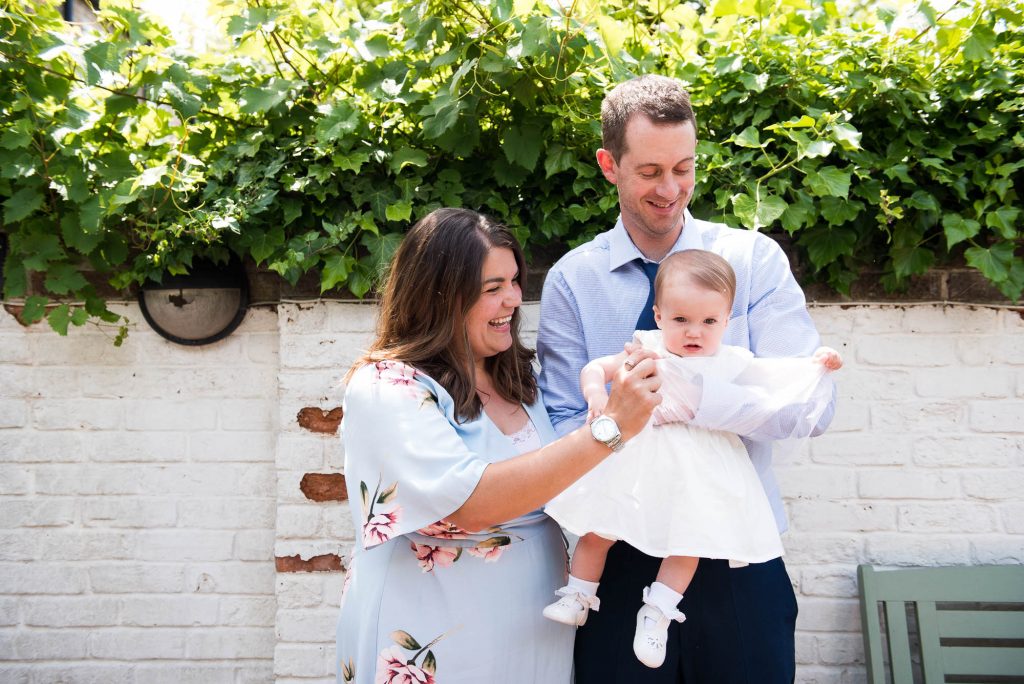 Happy family christening photography Surrey
