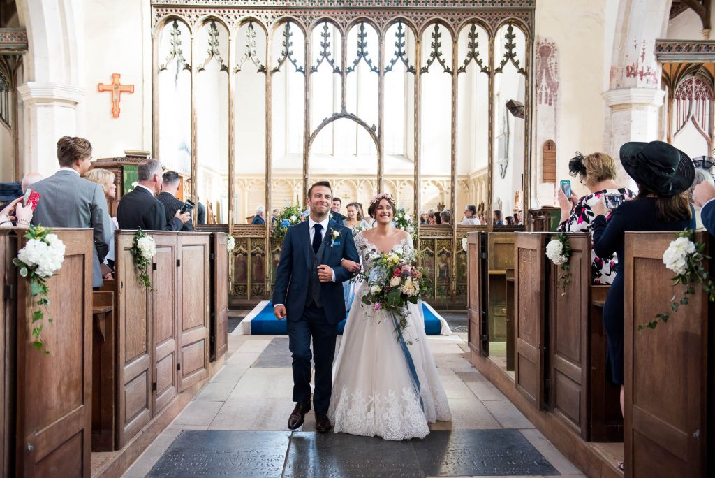 Jay West Bride with Calvin Klein groom Norfolk church wedding portrait