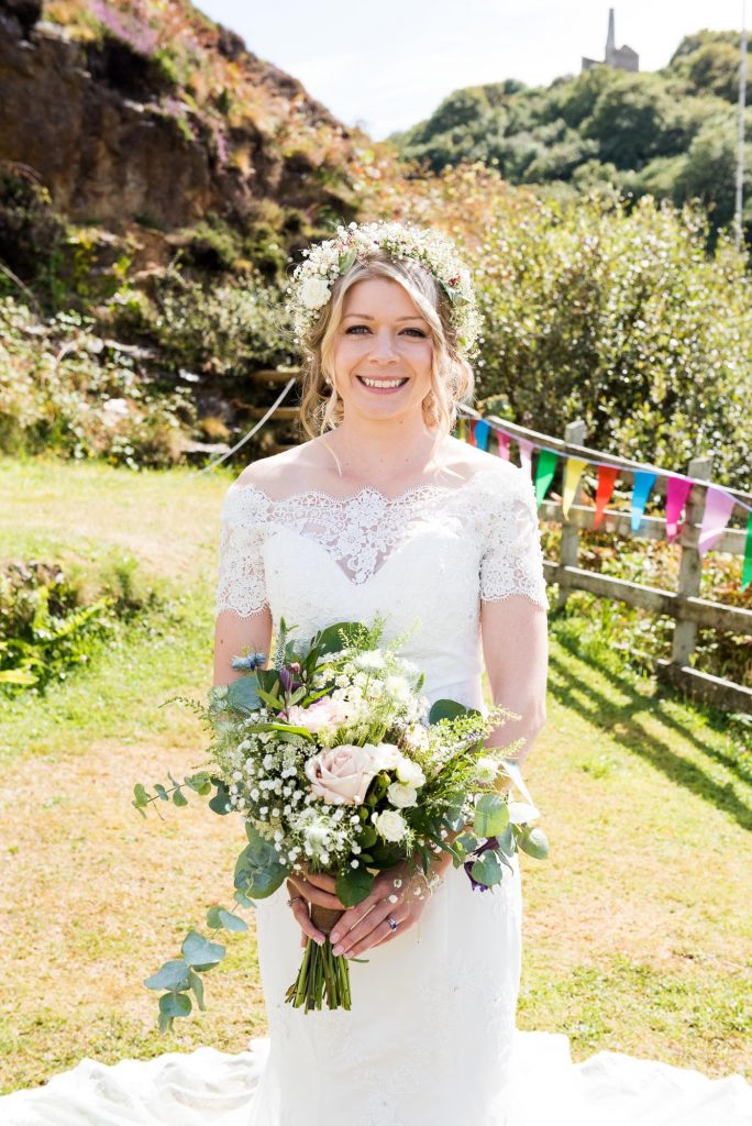 Natural boho bride wearing Gysophila floral crown holding Flowershed Trebilocks Flowers