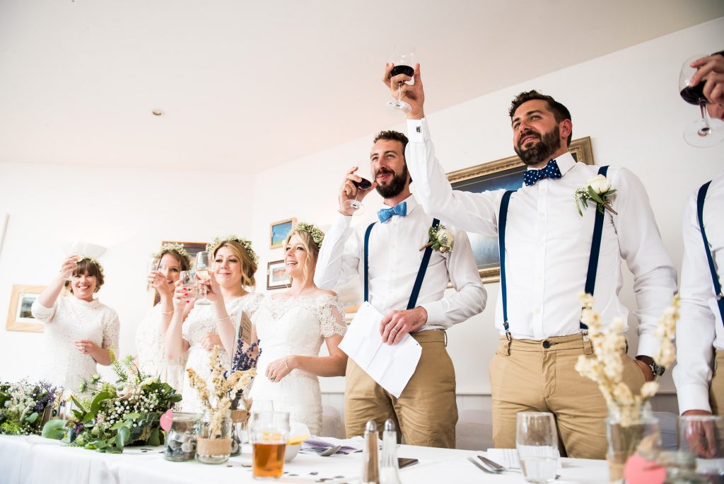 Standing toast to celebrate Cornwall wedding