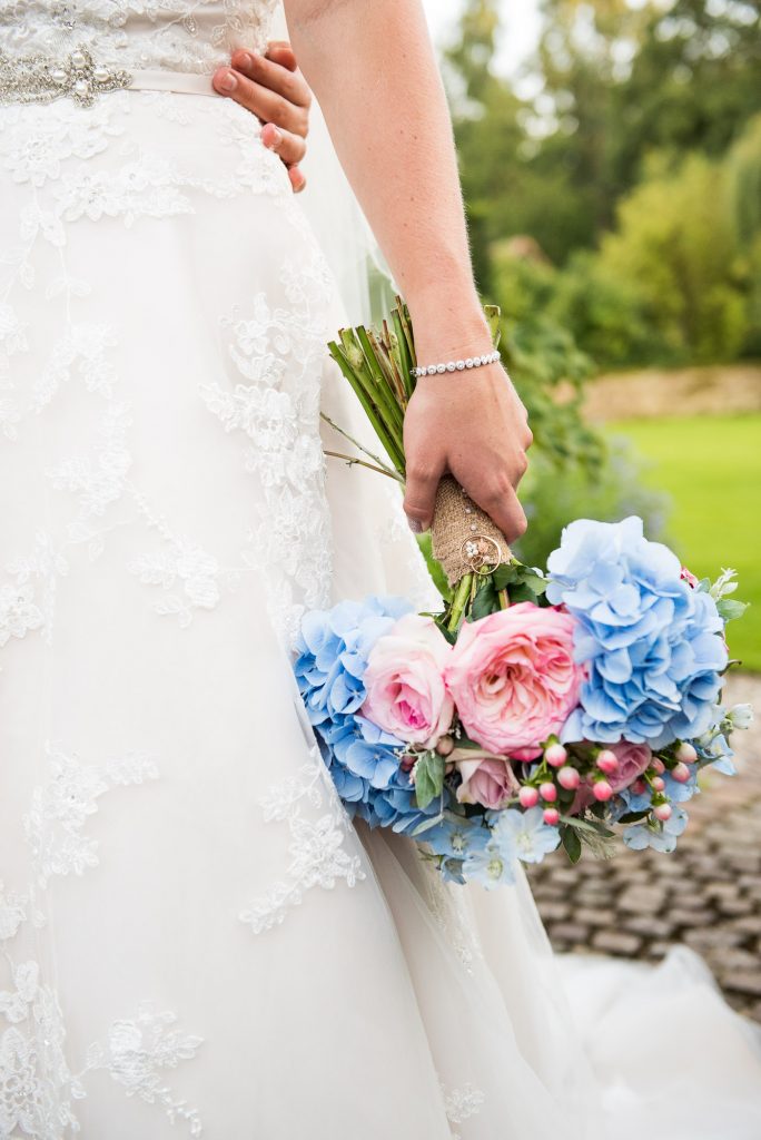 Bride holding Hannah Martin pastel bouquet