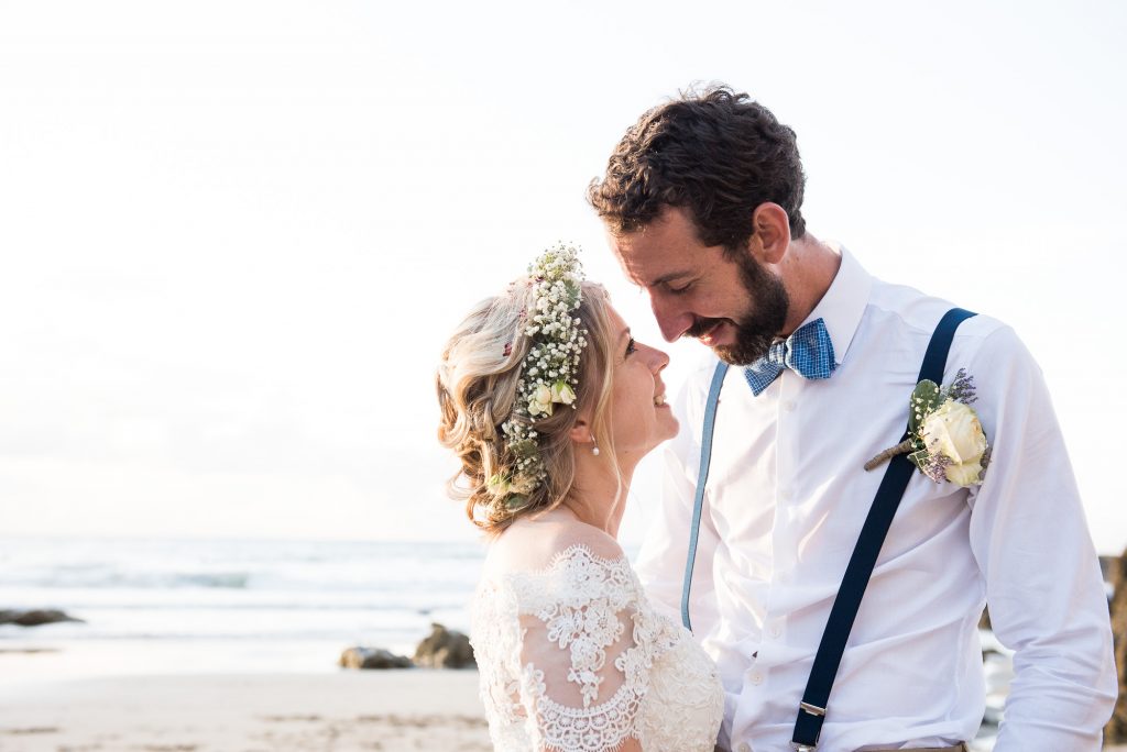Boho bride with groom Cornwall beach wedding portrait 