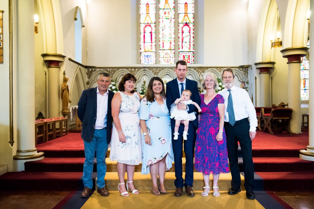 Natural christening family portrait