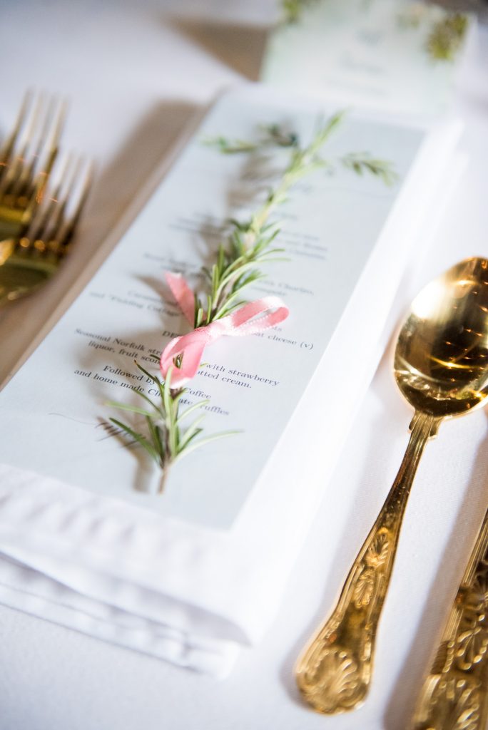 Gold cutlery and rosemary table setting Norfolk Barn wedding