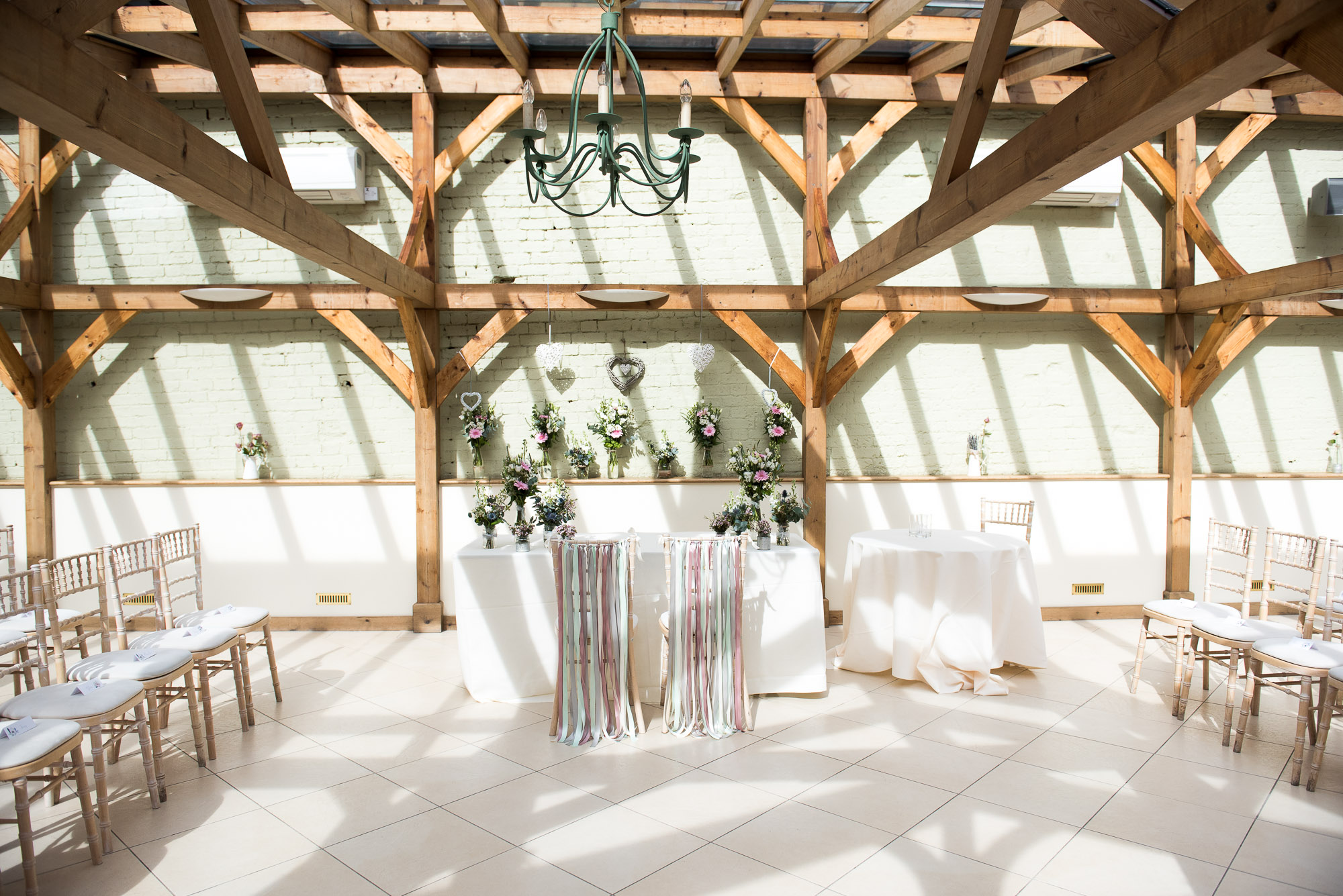 Gaynes Park conservatory filled with wedding details