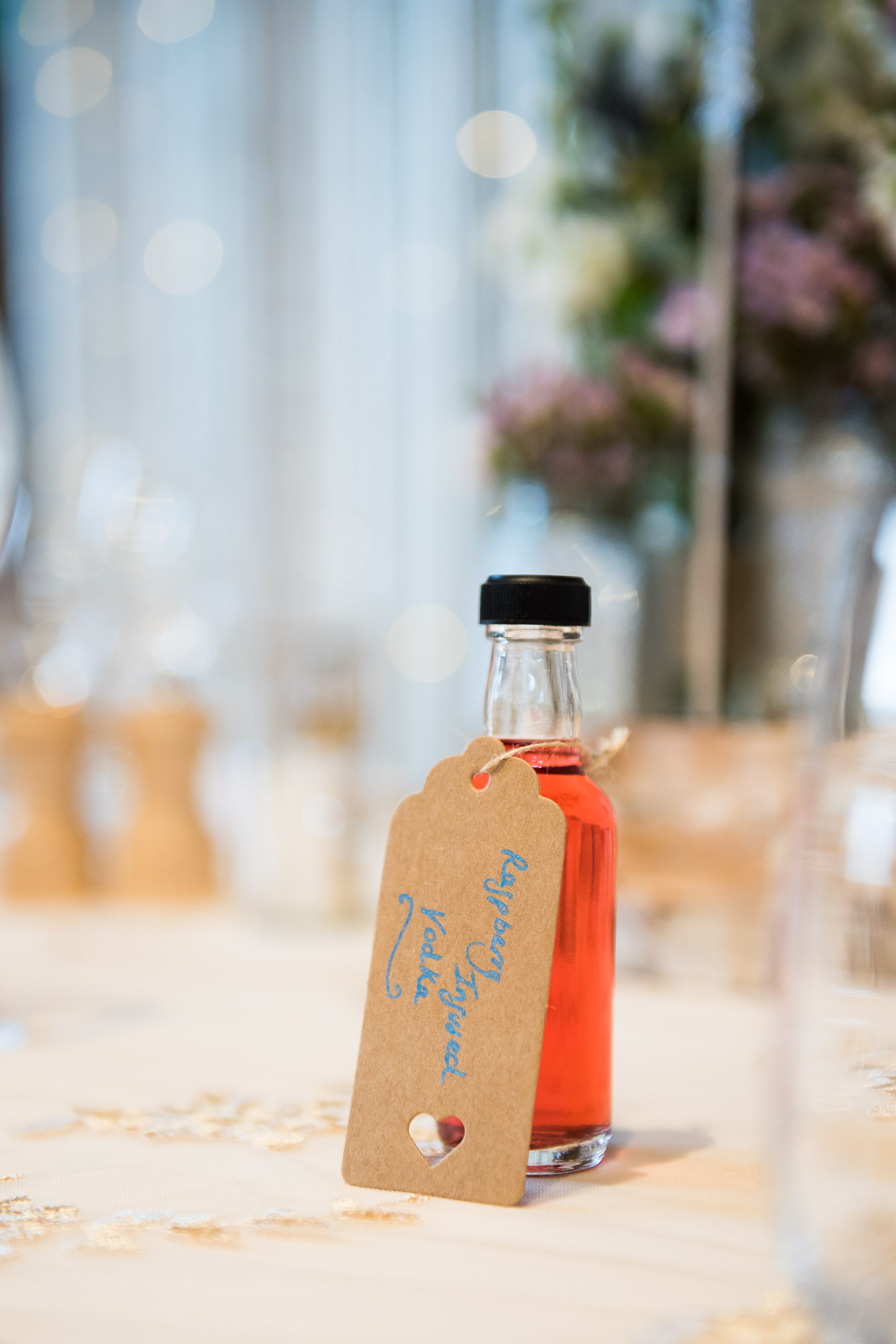 DIY wedding favour of infused vodka bottles