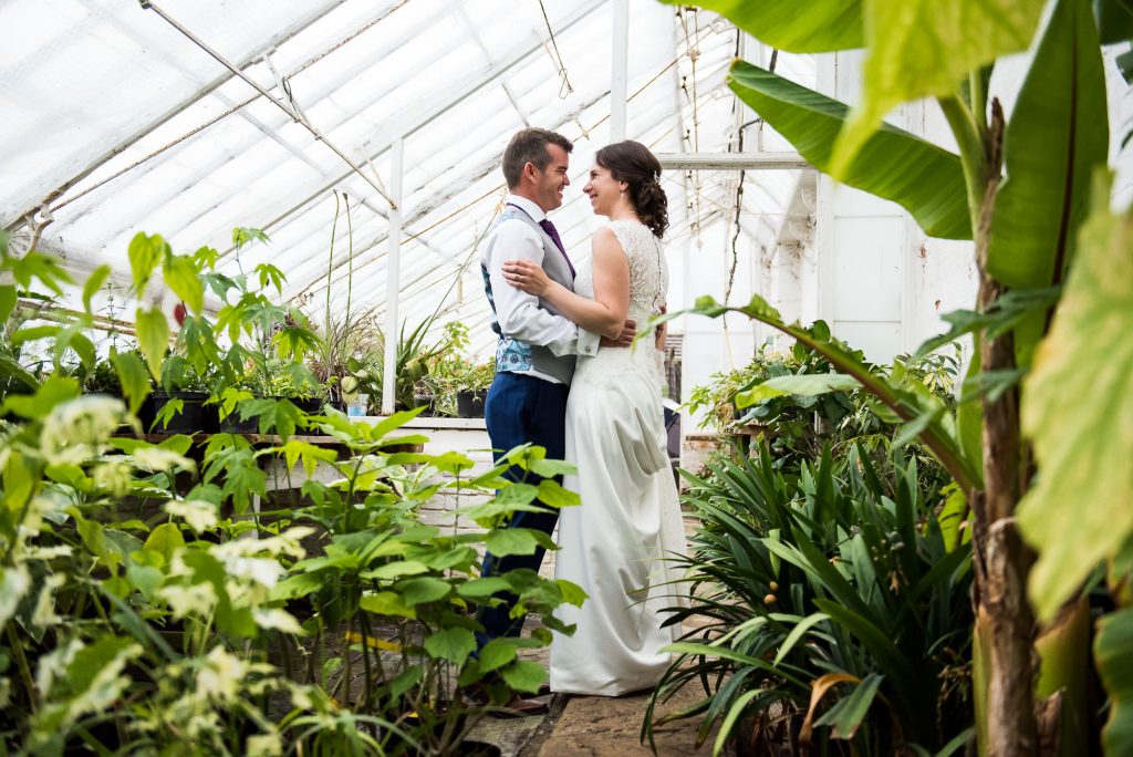 Creative wedding photography in greenhouse Surrey wedding