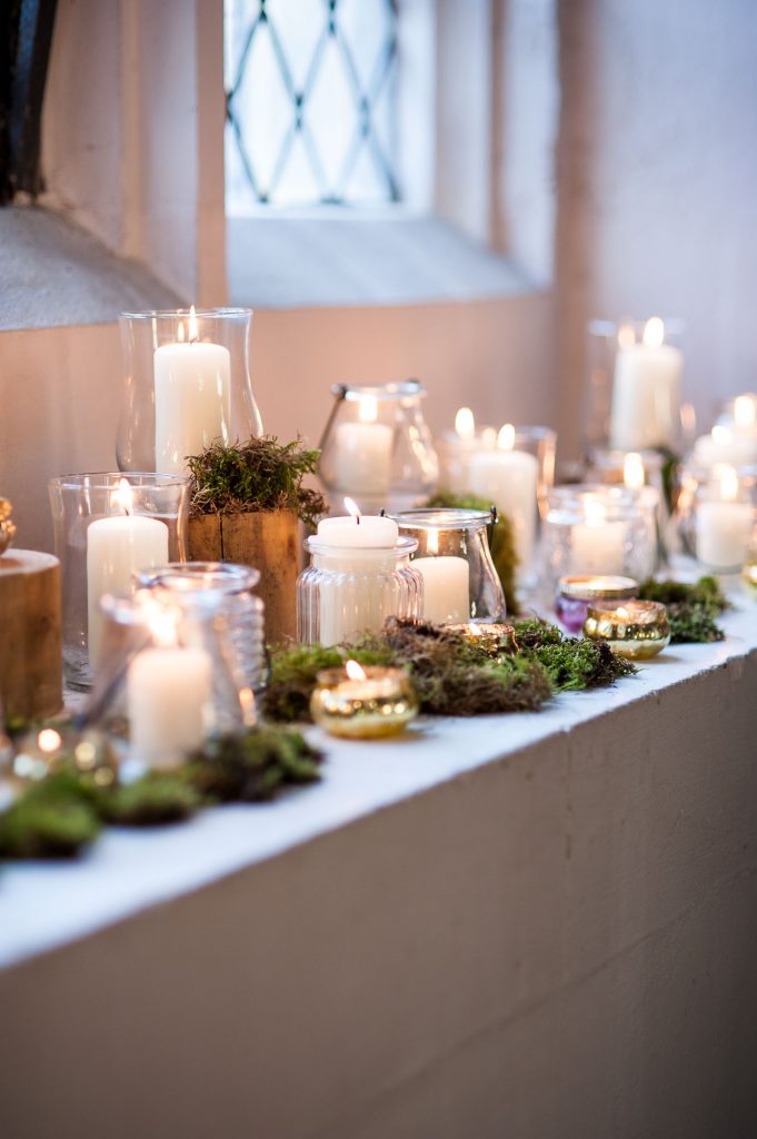 Ashridge House Wedding. Natural Wedding Photography. Hygge wedding vibes with candles filling the church