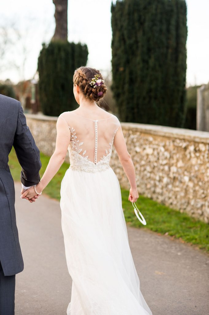 Ashridge House Wedding. Natural Wedding Photography. Gorgeous sheer lace back wedding dress from Berhamstead Brides.