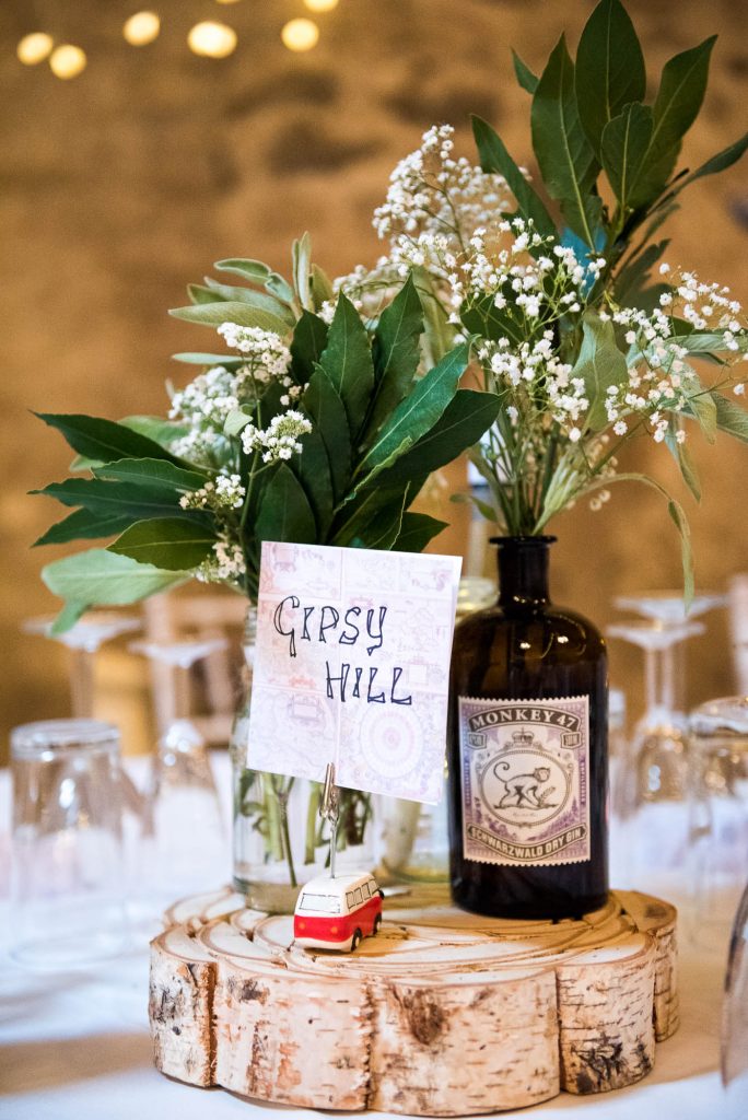 Park House Barn, Rustic Barn Wedding, Gin Bottle Centre Pieces Filled with Natural Herbs and Flowers
