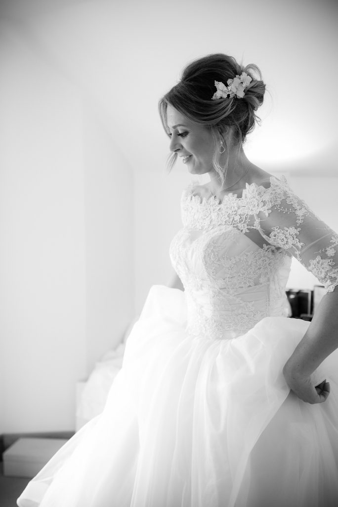 Great Fosters. Natural Wedding Photography. Candid Black and White Portrait of the Bride.