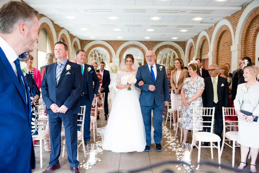 Great Fosters. Natural Wedding Photography. Emotional Reactions When the Bride Enters The Ceremony.