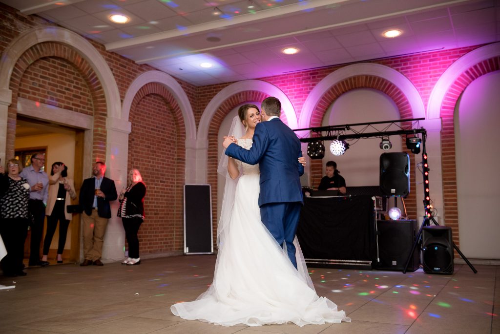 Great Fosters. Natural Documentary Wedding Photography, Surrey. The Bride and Groom Share their First Dance.