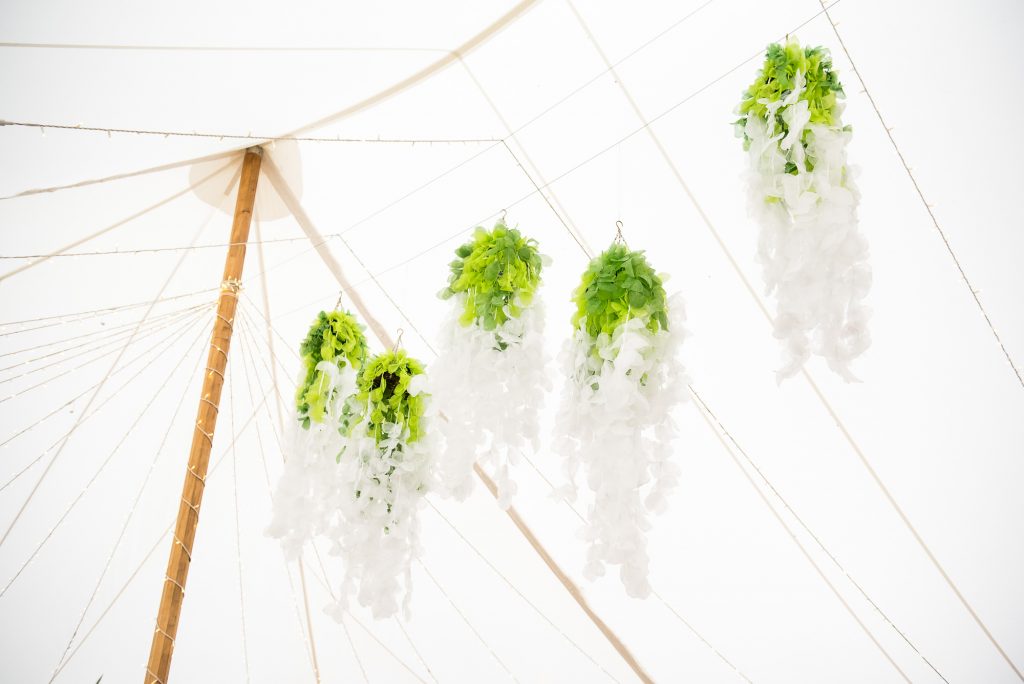 Outdoor Wedding Ceremony, Surrey Wedding Photography, Wedding Marquee Decorated with Green and White Flowers and Decor