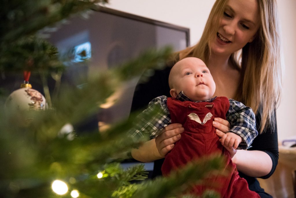 Newborn Photography Guildford, Christmas Family Shoot, Candid Moment Of Mother And Baby