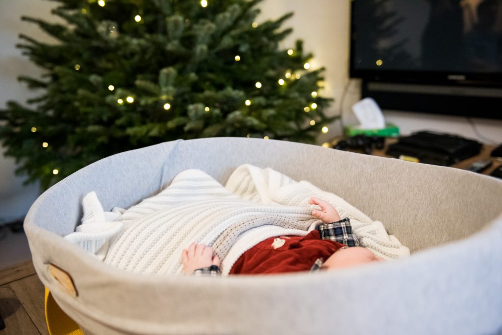 Newborn Photography Guildford, Christmas Family Shoot, Baby Sleeping in Bassinet 
