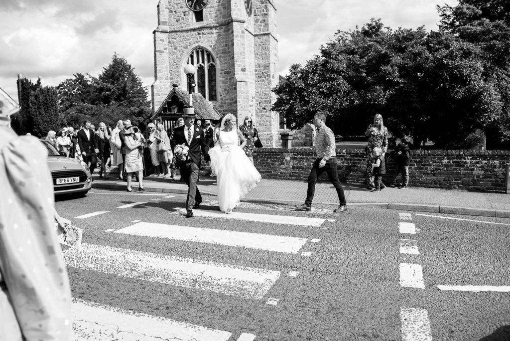 Outdoor Wedding Photography Surrey, Guests Walk From The Church To The Garden Reception