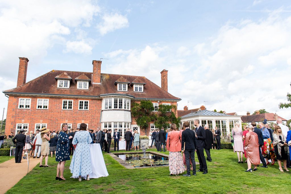Outdoor Wedding Photography Surrey, Guests Enjoy A Gorgeous Garden Reception