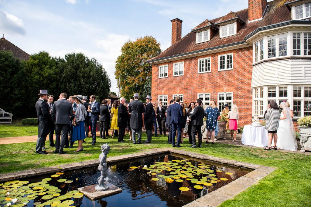 Outdoor Wedding Photography Surrey, Guests Enjoy A Gorgeous Garden Reception
