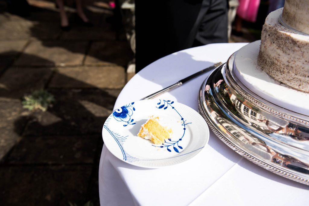 Outdoor Wedding Photography Surrey, A Slice of Wedding Cake On Royal Copenhagen China