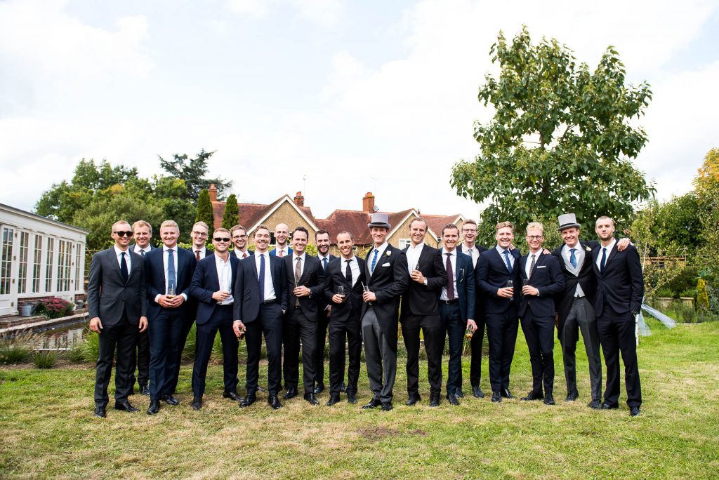 Outdoor Wedding Photography Surrey, Groomsmen Party Stand For A Group Photograph