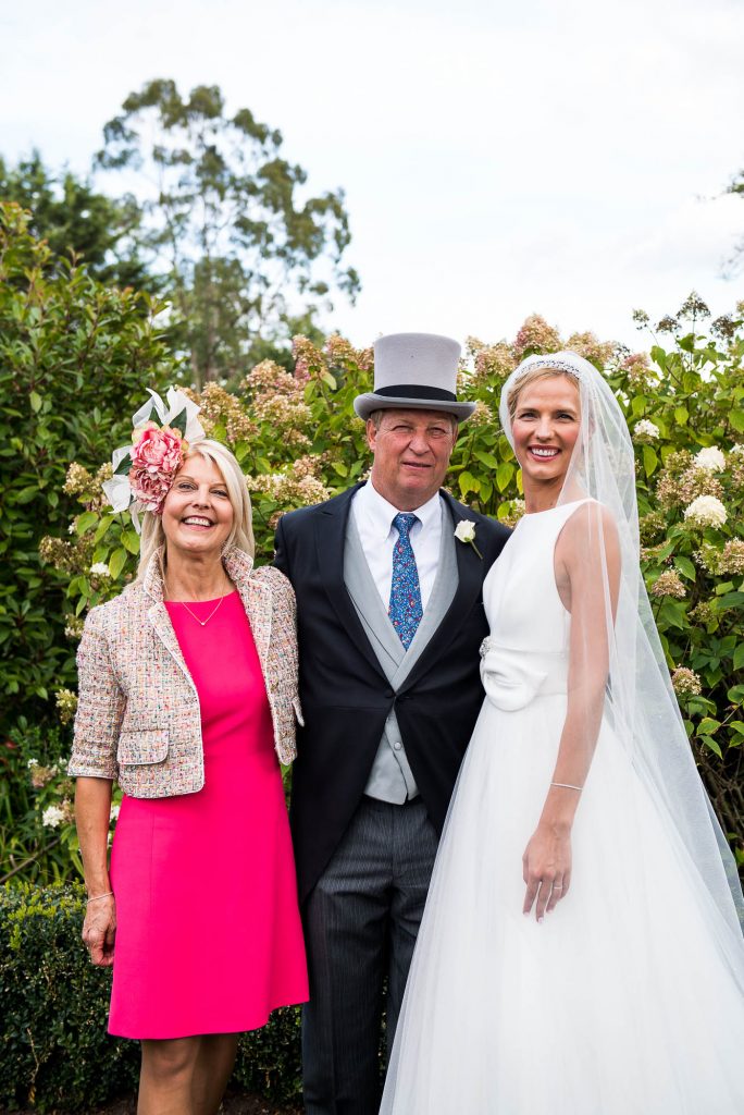 Outdoor Wedding Photography Surrey, Family Portrait with The Bride and Her Mother and Father