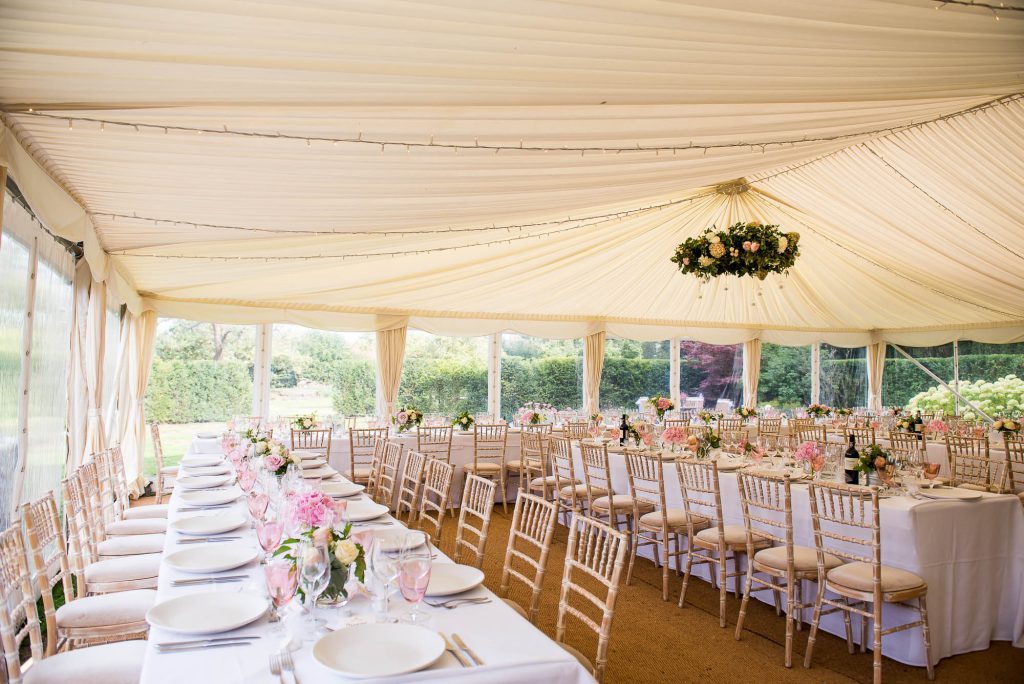 Outdoor Wedding Photography Surrey, Gorgeous Marquee Decorated With White and Pink Flowers