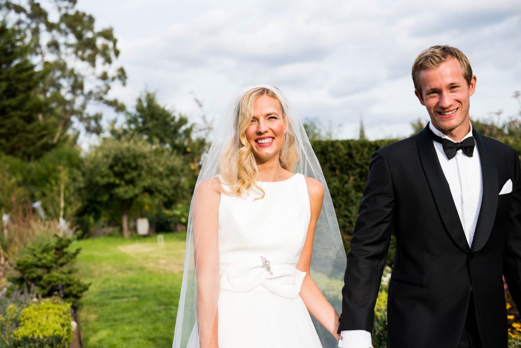 Outdoor Wedding Photography Surrey, Elegant Bride Smiling Naturally In The Sunshine
