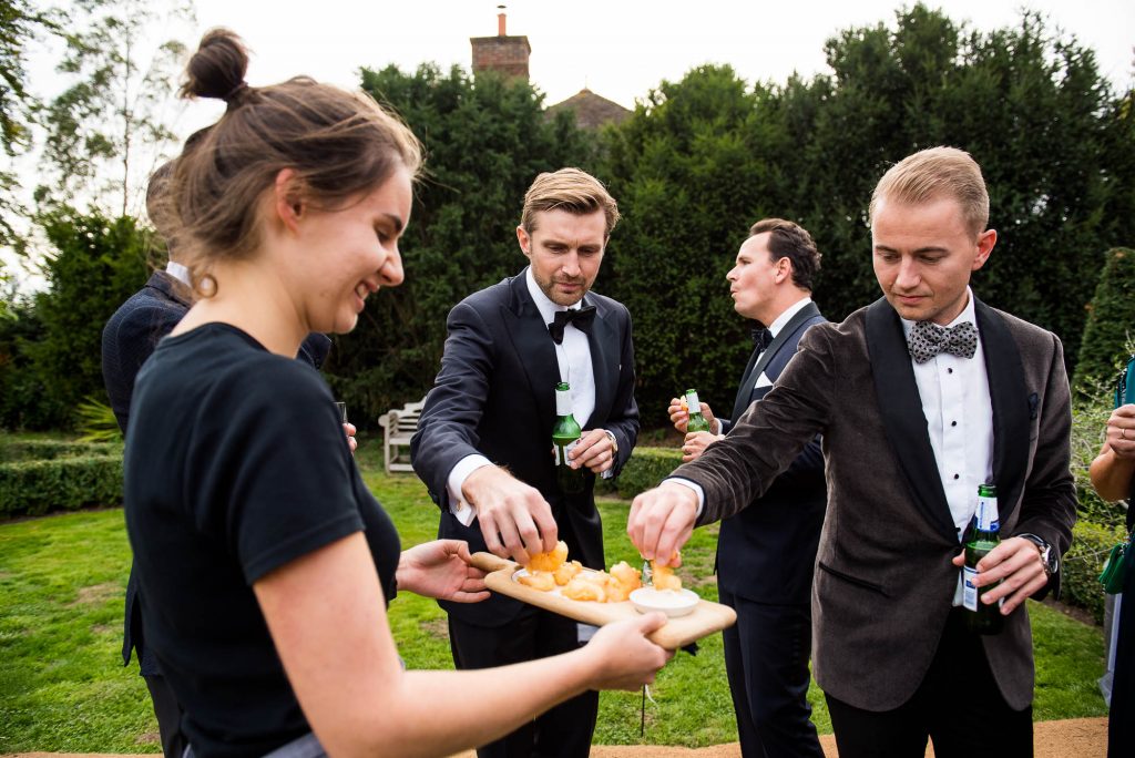 Outdoor Wedding Photography Surrey, Glamorous Wedding Guests Enjoy Catered Food From Kalm Kitchen