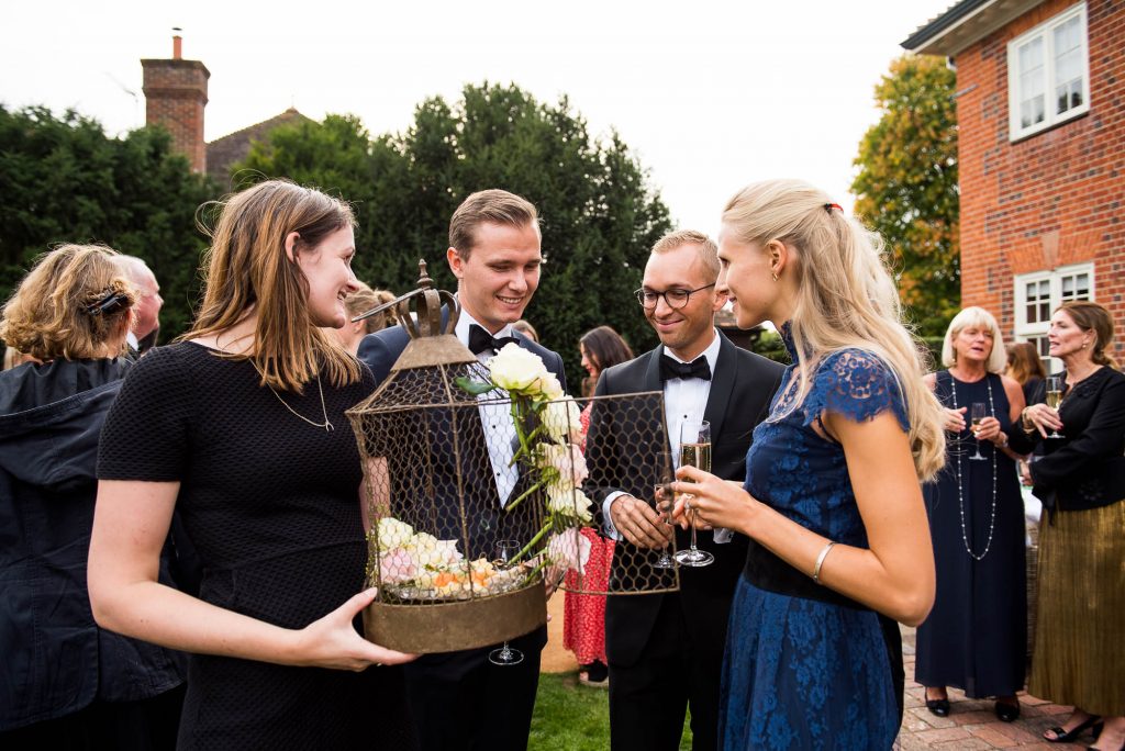 Outdoor Wedding Photography Surrey, Glamorous Wedding Guests Enjoy Catered Food From Kalm Kitchen
