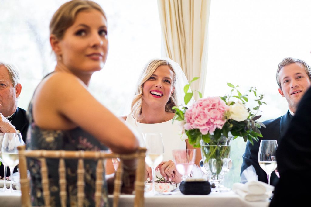 Outdoor Wedding Photography Surrey, Stunning Bride Smiling As Speeches Start