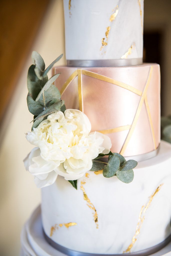 lgbt wedding photographer, modern white and gold marbled four tier wedding cake