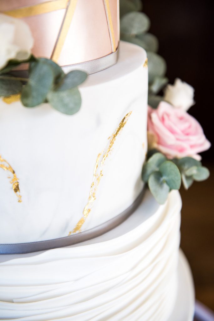 lgbt wedding photographer, modern white and gold marbled four tier wedding cake