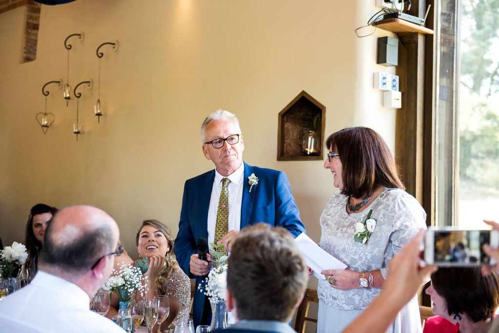 lgbt wedding photographer, father and mother of the bride give a speech, Dodmoor House Wedding