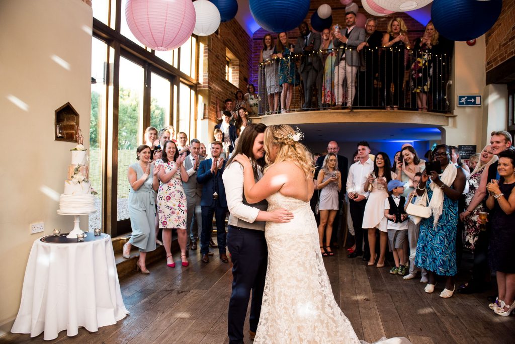 lgbt wedding photographer, brides share their first dance at Dodmoor House
