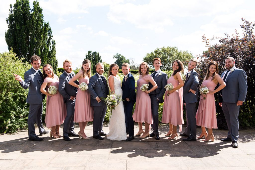 charming pastel pink british summer wedding party - group photographs at your wedding