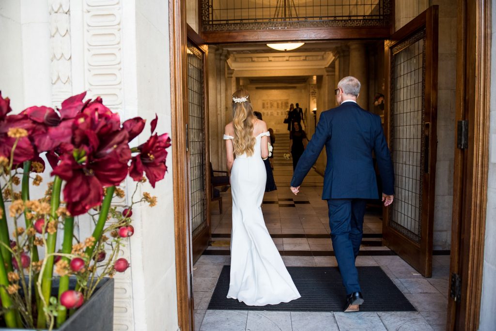  Old Marylebone Town Hall Wedding, father of the bride arrives with his daughter to London wedding