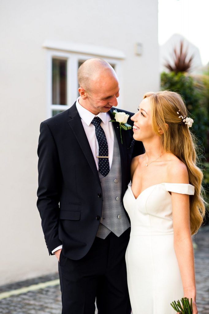 Old Marylebone Town Hall Wedding, candid couples portrait in traditional London mews