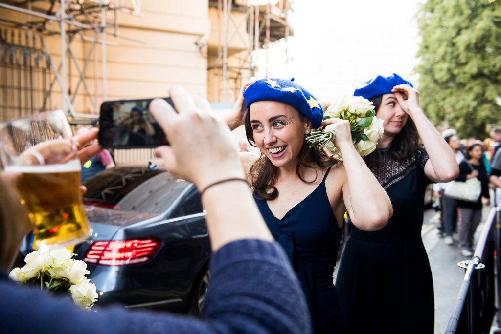 Old Marylebone Town Hall Wedding, bridesmaids wear EU hats for the anti-Brexit march