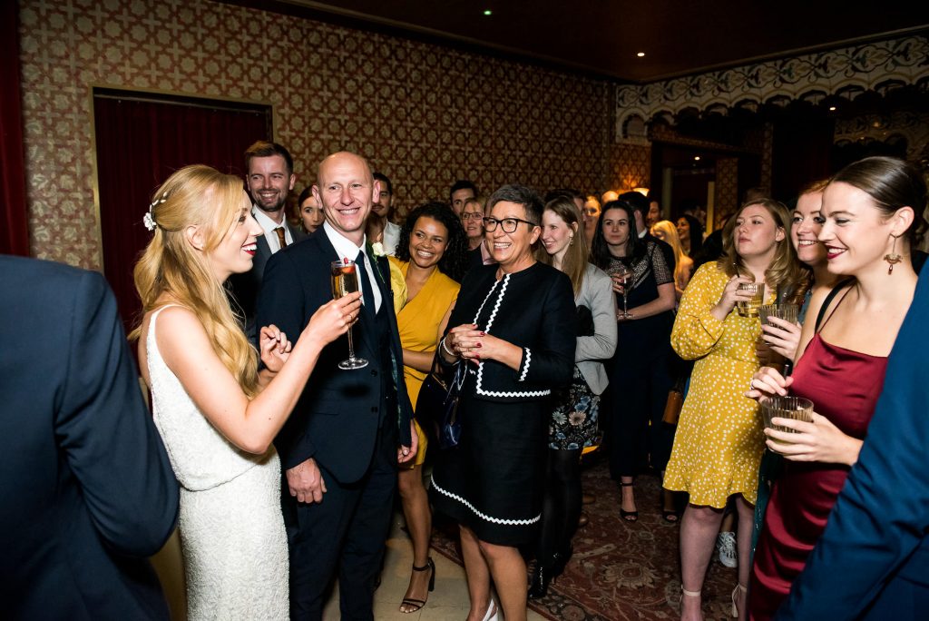 Old Marylebone Town Hall Wedding, candid guest reception photography