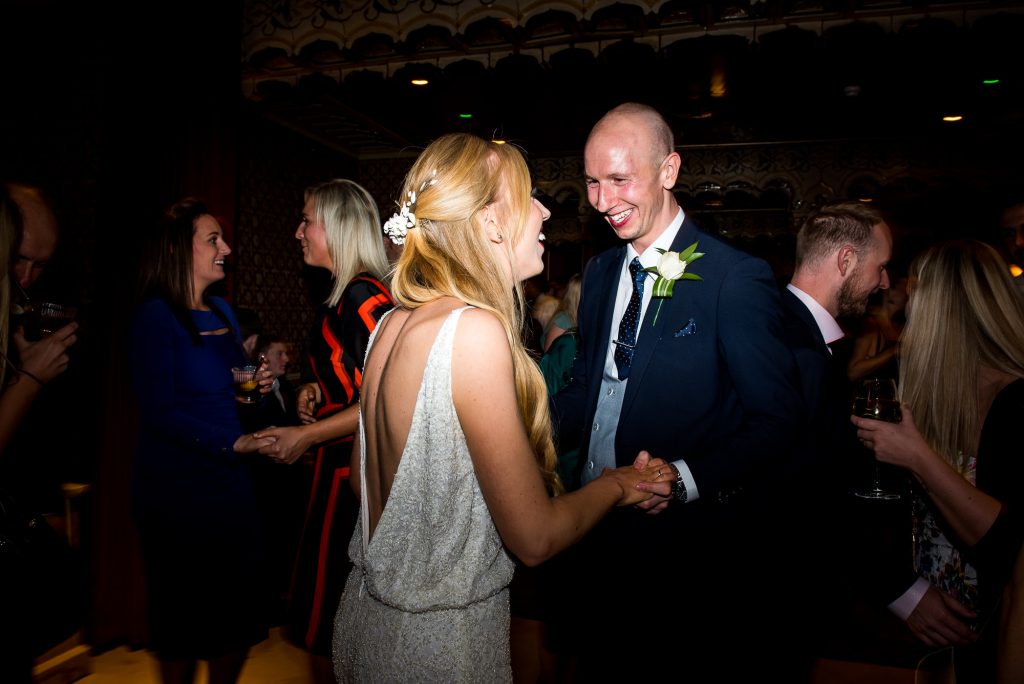 Old Marylebone Town Hall wedding, stylish bride and groom share first dance