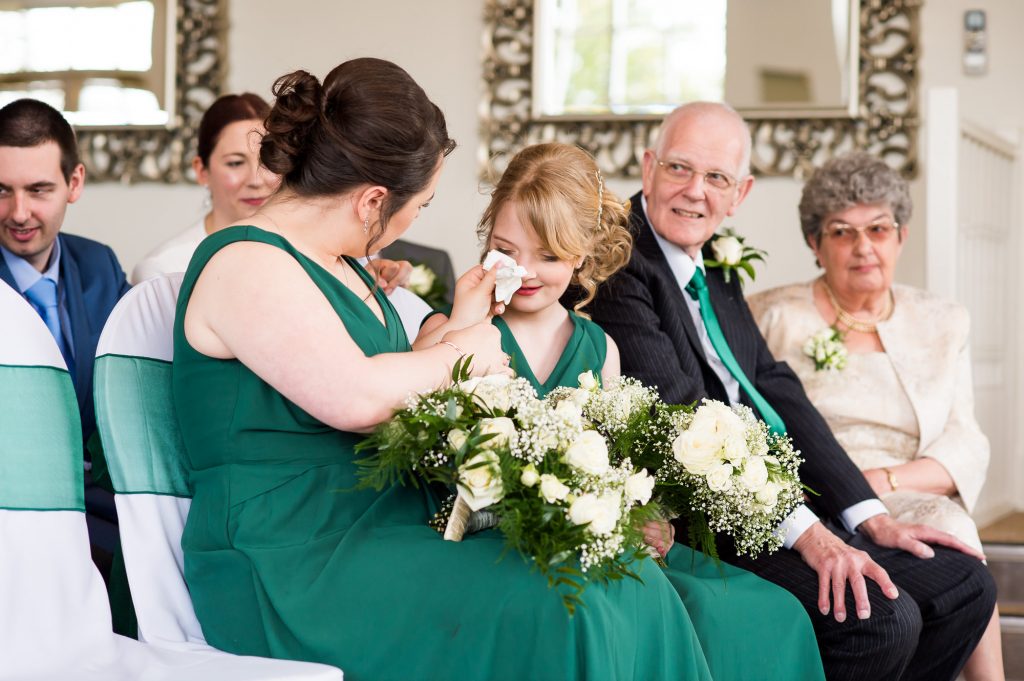 LGBT wedding photography, wedding guests shed a tear during the ceremony