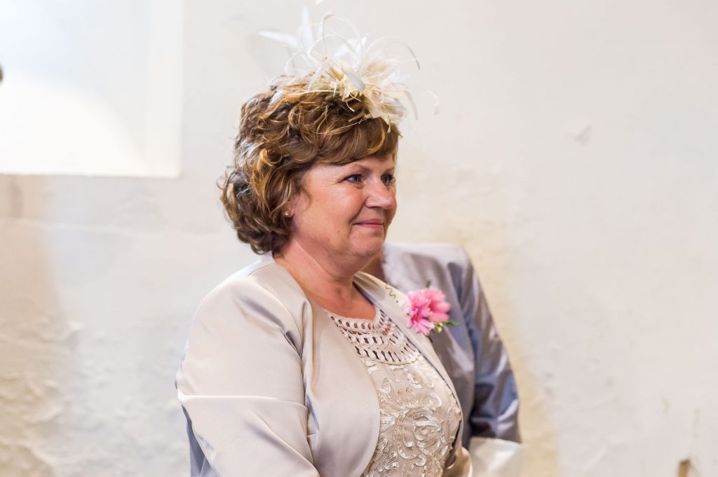 mother of the bride smiles lovingly