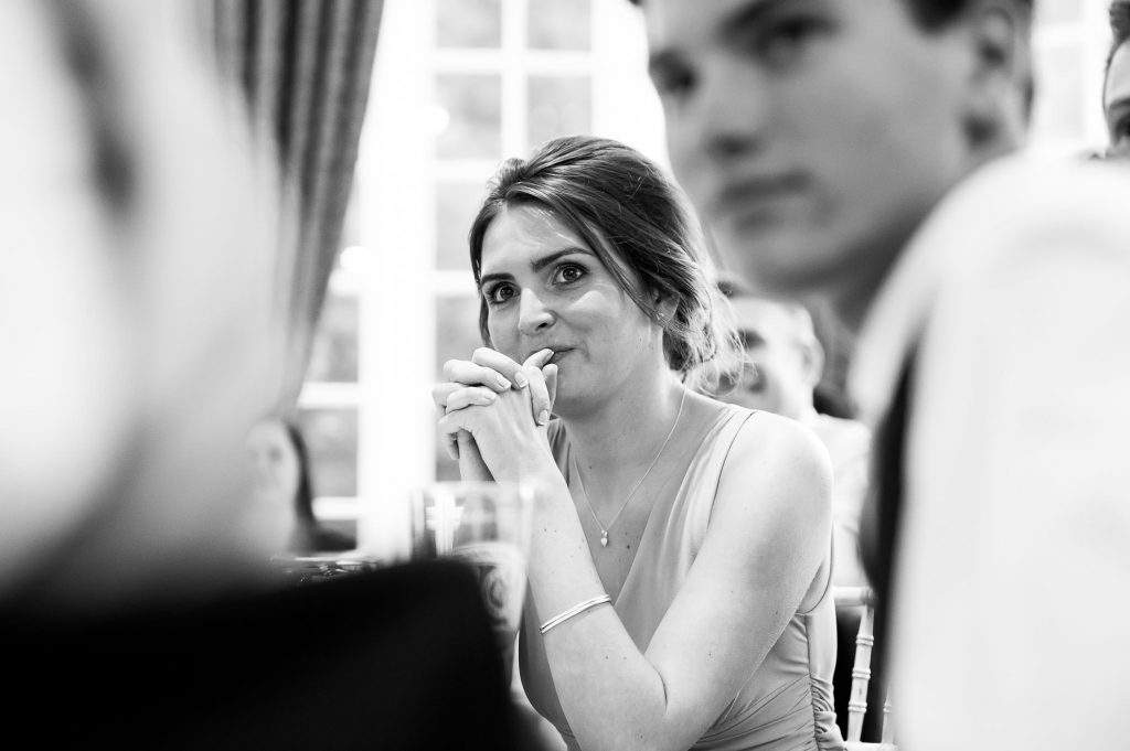 Horsey Towers, black and white photograph of wedding guest reaction