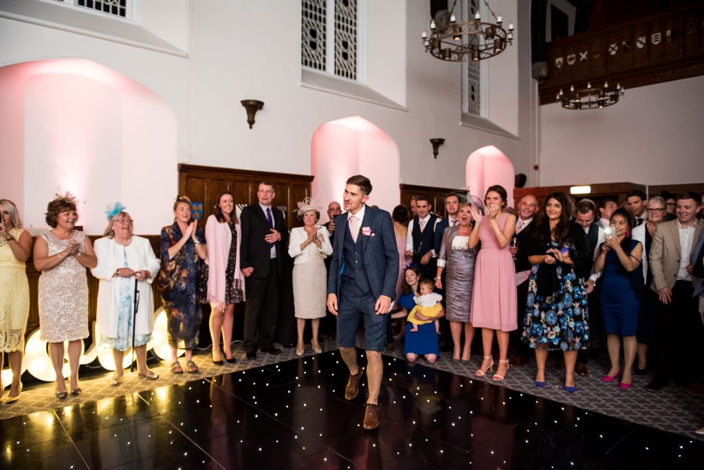 st martha's wedding, groom dressed in suit shorts on the dance floor