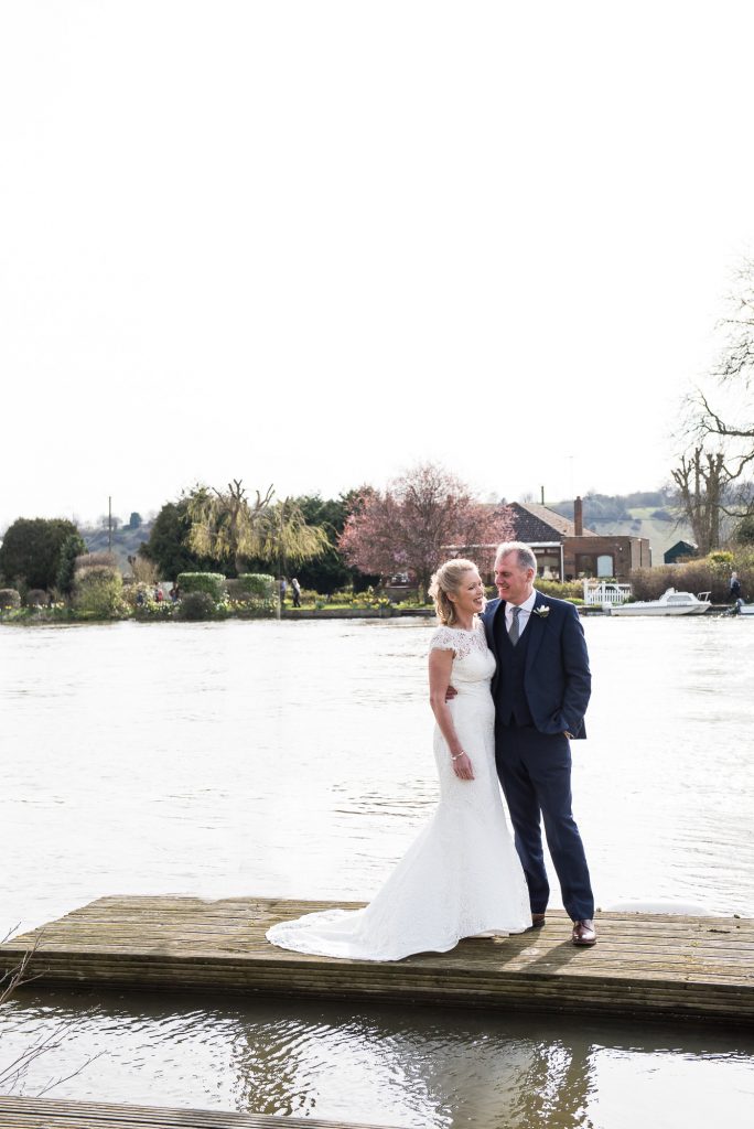Couple stand together on s dock, Marlow wedding photography